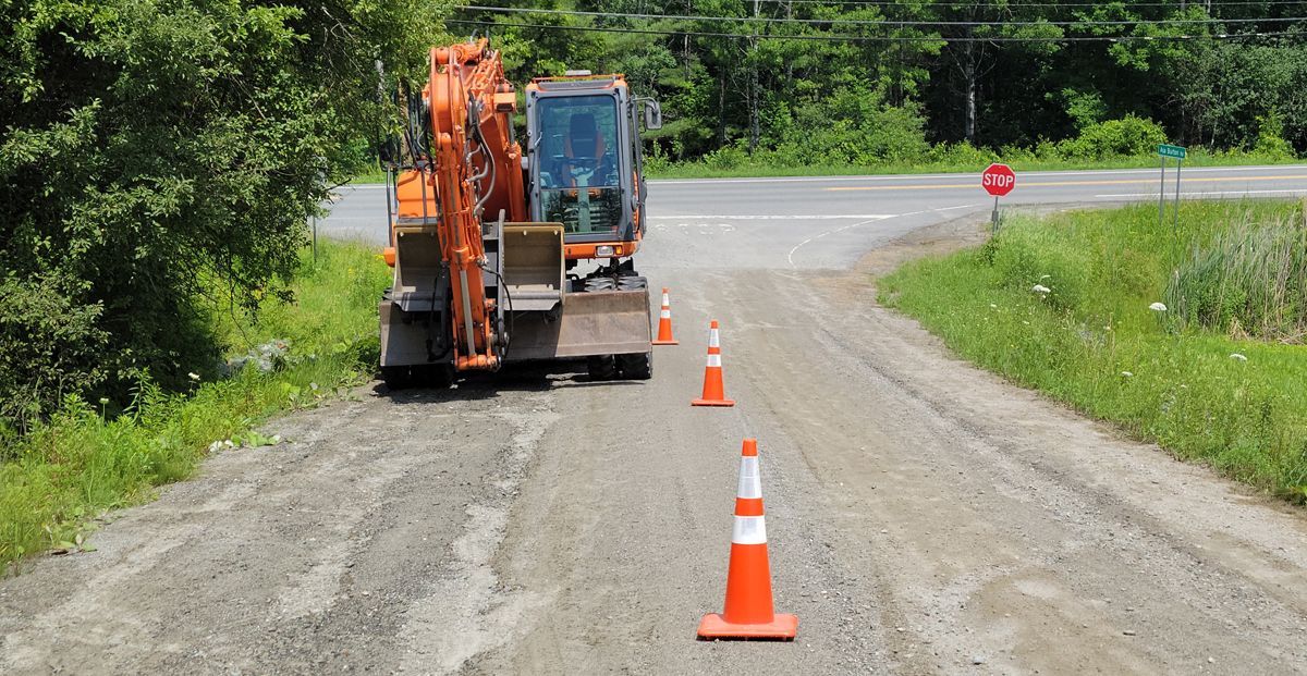 Town excavator idled for now